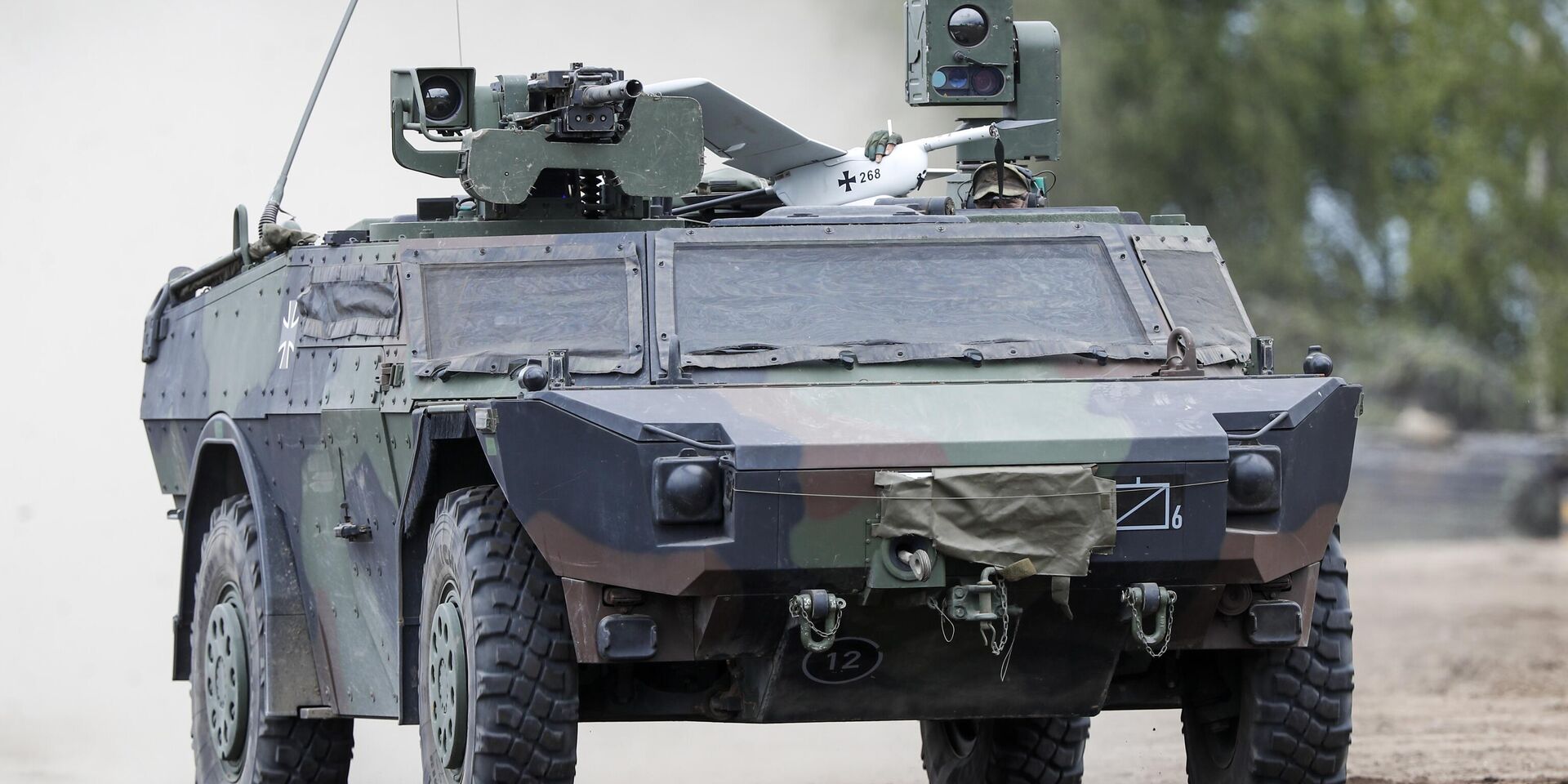 Военная машина НАТО с беспилотником на крыше во время военных учений на полигоне в Пабраде, в 60 км к северу от столицы Литвы Вильнюса в 2023 году - ИноСМИ, 1920, 09.10.2025