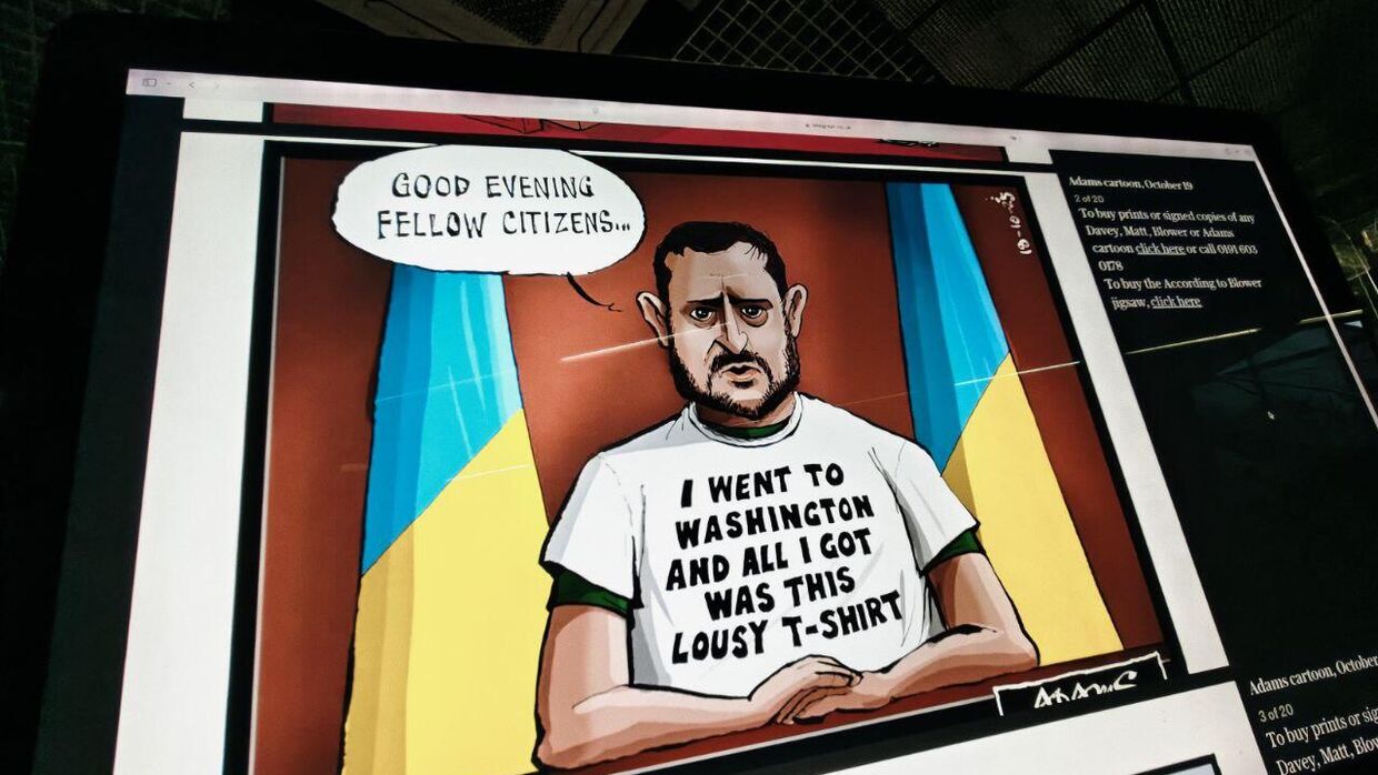 Карикатура с сайта The Telegraph на экране монитора