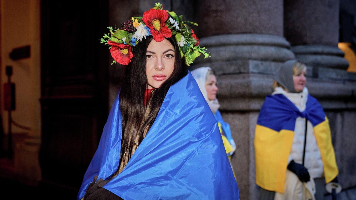 Участники проукраинской демонстрации, посвященной четырехлетней годовщине СВО, в Копенгагене, Дания, 24 февраля 2026 года