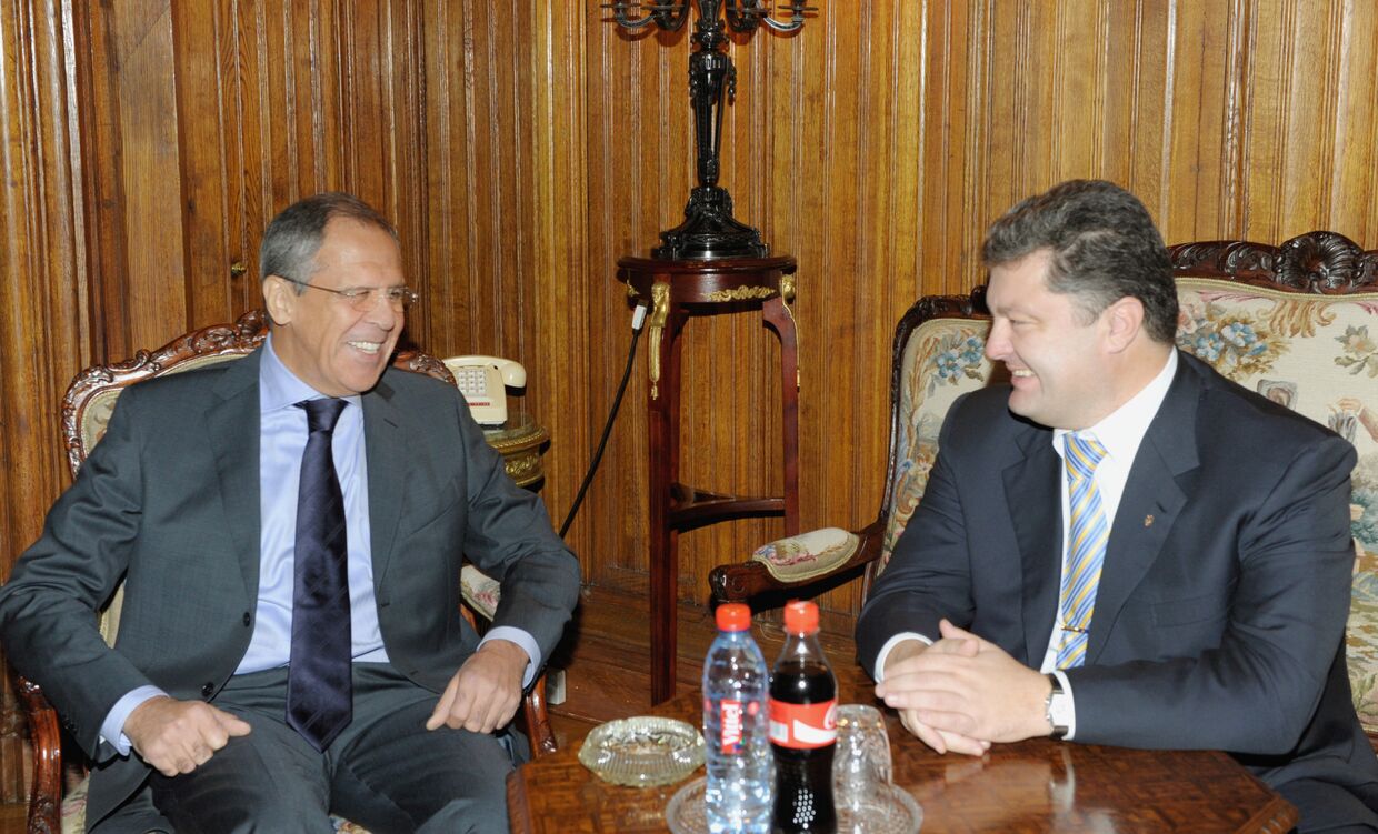 Сергей Лавров и Петр Порошенко во время встречи в Москве