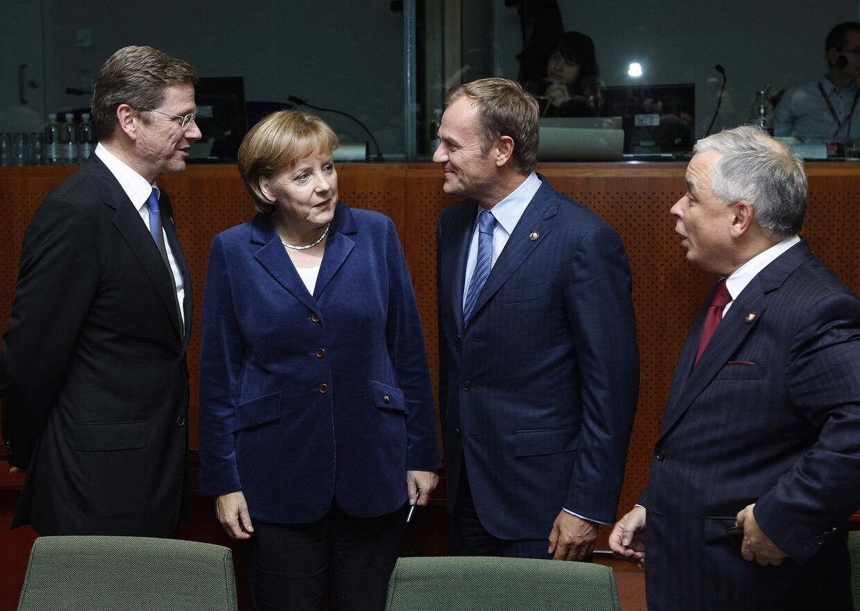 Президент и премьер-министр Польши Лех Качински и Дональд Туск на саммите ЕС