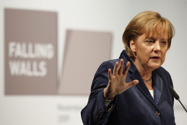 Ангела Меркель произносит речь на конференции, посвещенной годовщине падения Берлинской стены
