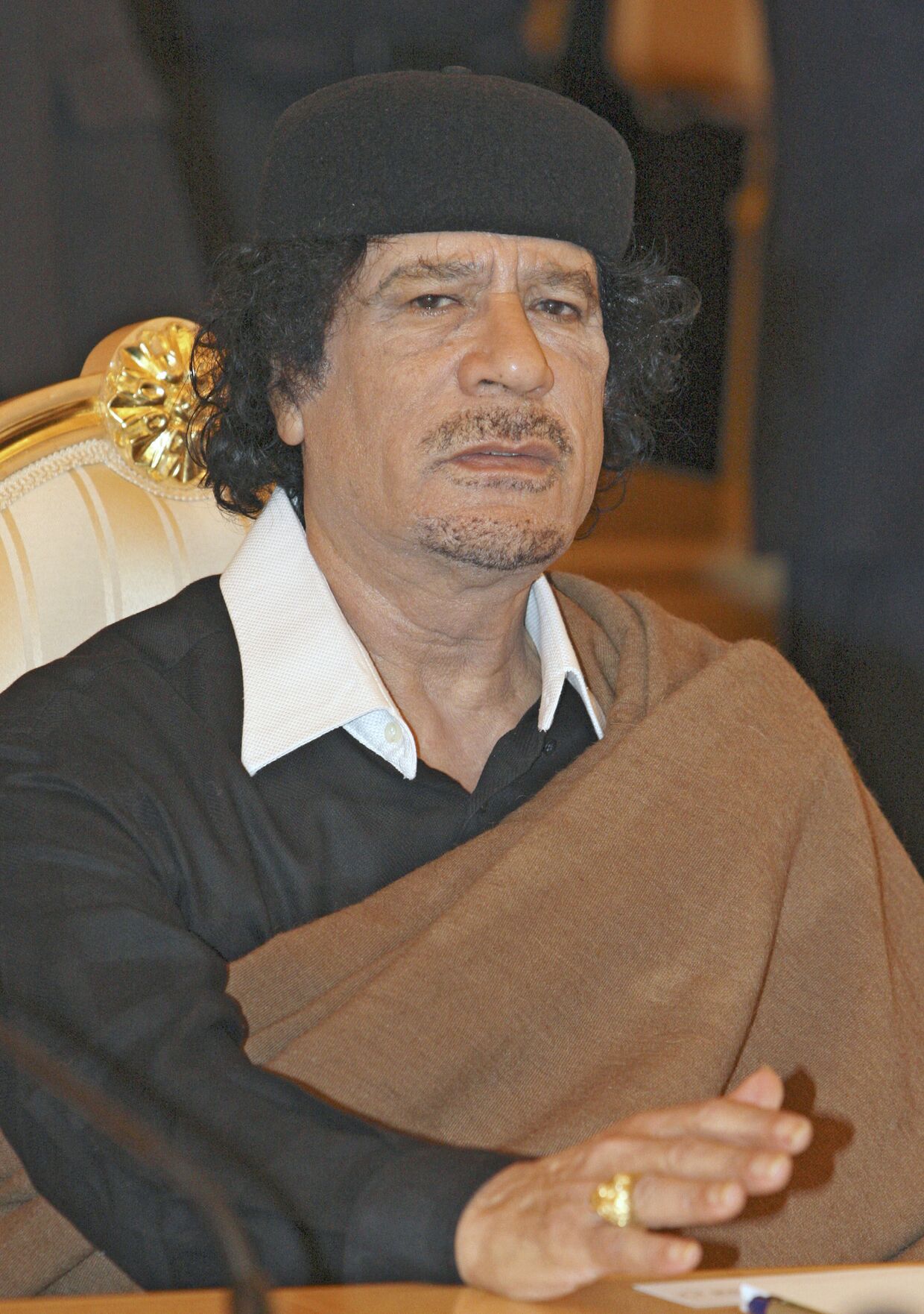 Лидер Ливии полковник Муаммар Каддафи