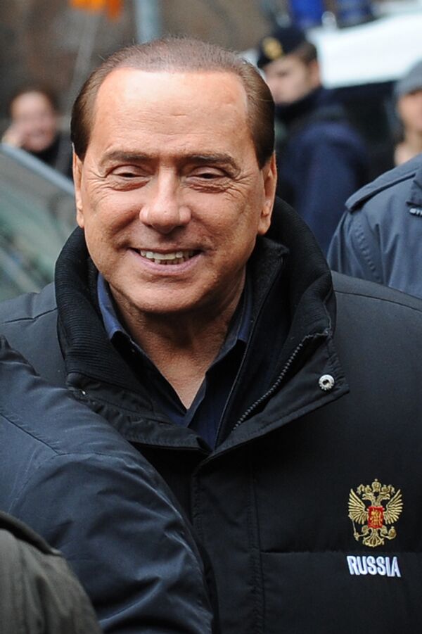 Сильвио Берлускони в куртке, подаренной Владимиром Путиным