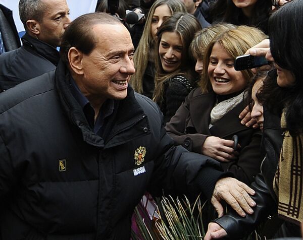Сильвио Берлускони в куртке, подаренной Владимиром Путиным