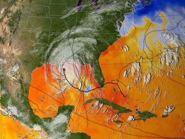 Траектория урагана Катрина на фоне облачности и температуры поверхности моря на 29 августа 2005 года.