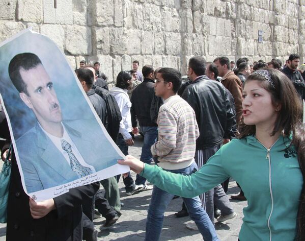 Сотни тысяч сторонников президента Сирии Башара Асада вышли 29 марта на улицы Дамаска
