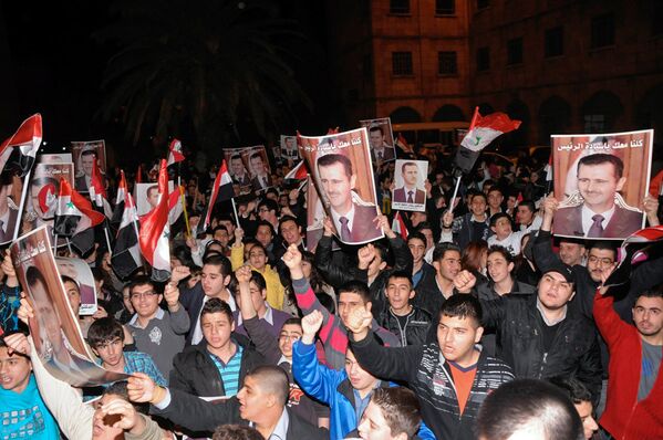  Сотни тысяч сторонников президента Сирии Башара Асада вышли 29 марта на улицы Дамаска