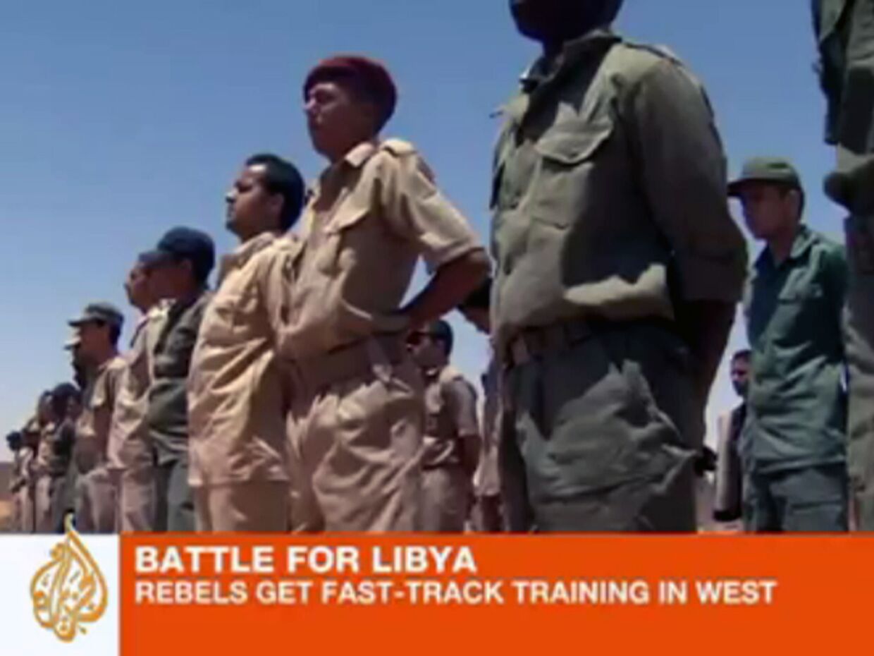 ИноСМИ__Ливийские повстанцы проходят тренировки перед боями