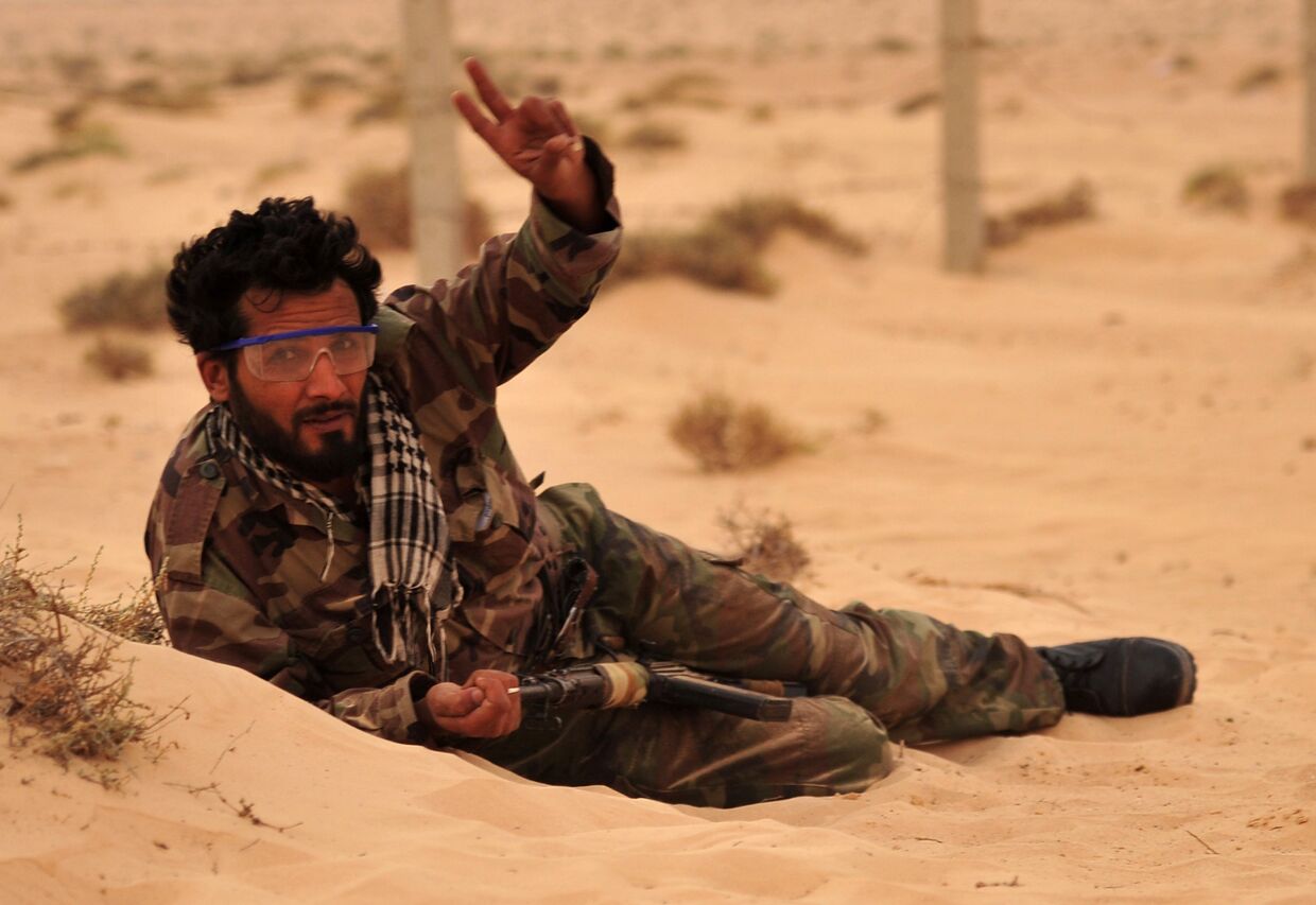 Ливийский повстанец во время военных действий