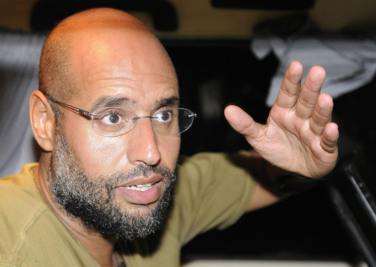 Якобы арестованный сын Каддафи - Сейф аль-Ислам Каддафи - прокатился с журналистами по Триполи