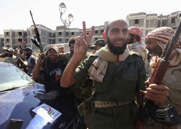 Ливийцы празднуют смерть Каддафи