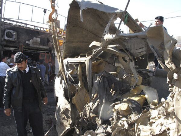 Последствия теракта в иракском городе Хилл