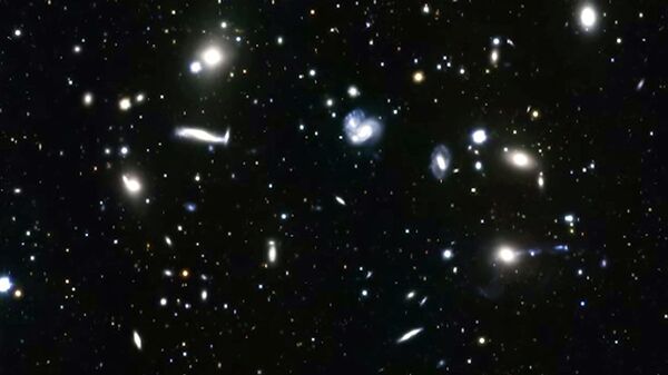 Молодое скопление галактик Abell 2151 в созвездии Геркулеса Молодое скопление галактик Abell 2151 в созвездии Геркулеса