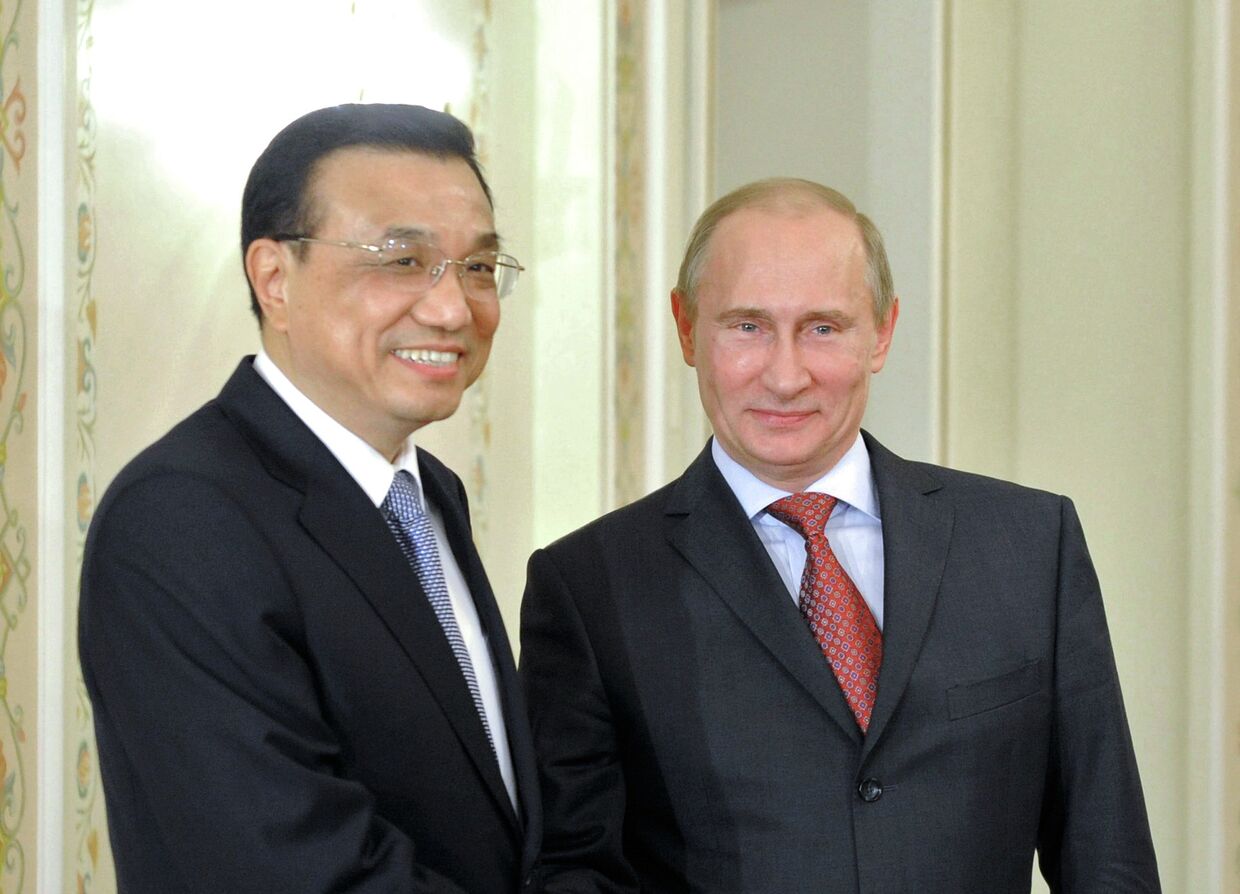 Премьер-министр РФ В.Путин провел переговоры с премьером Госсовета КНР Л.Кэцяном