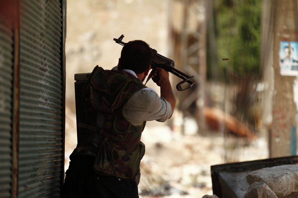 Сирийский солдат в районе Алеппо