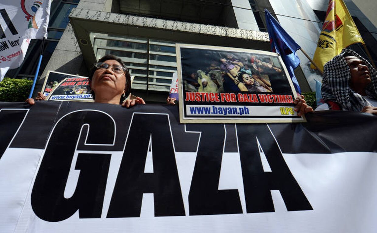 Акция протеста против военных действий в секторе Газа в Маниле