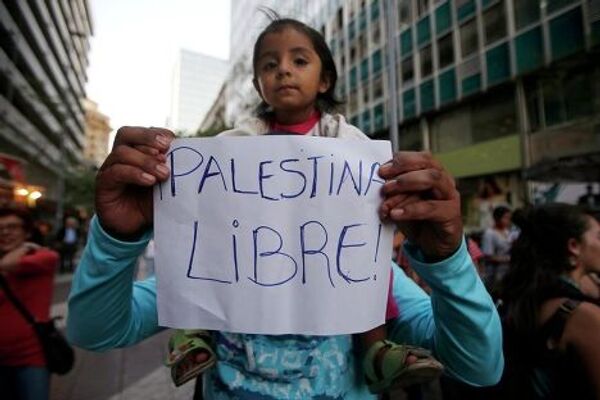 Акция протеста против военных действий в секторе Газа в Сантьяго, Чили