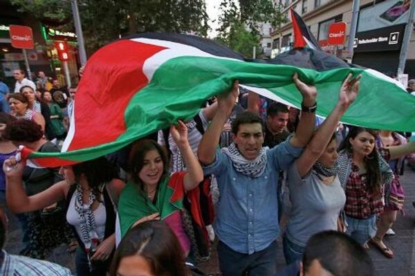 Акция протеста против военных действий в секторе Газа в Сантьяго, Чили