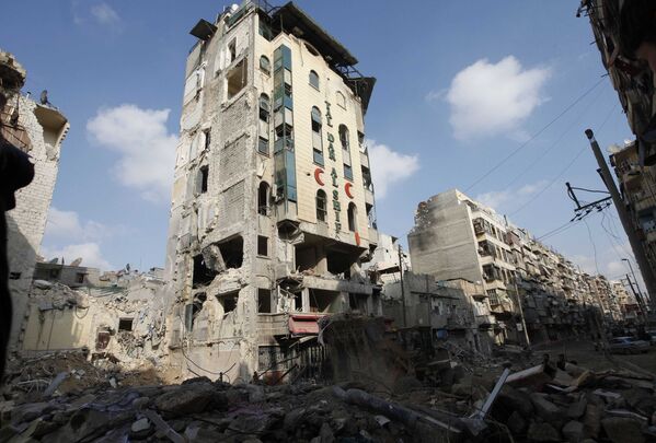 Разрушенное здание в Алеппо