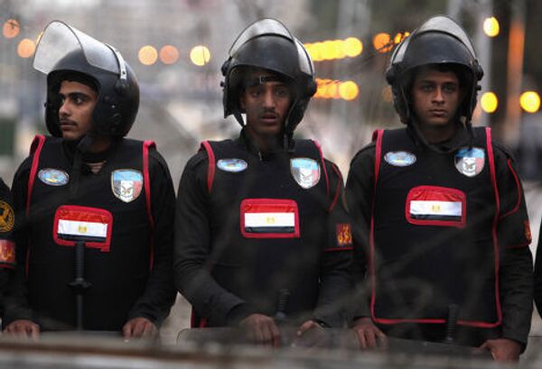 Полицейские во время протестов в Каире, Египет