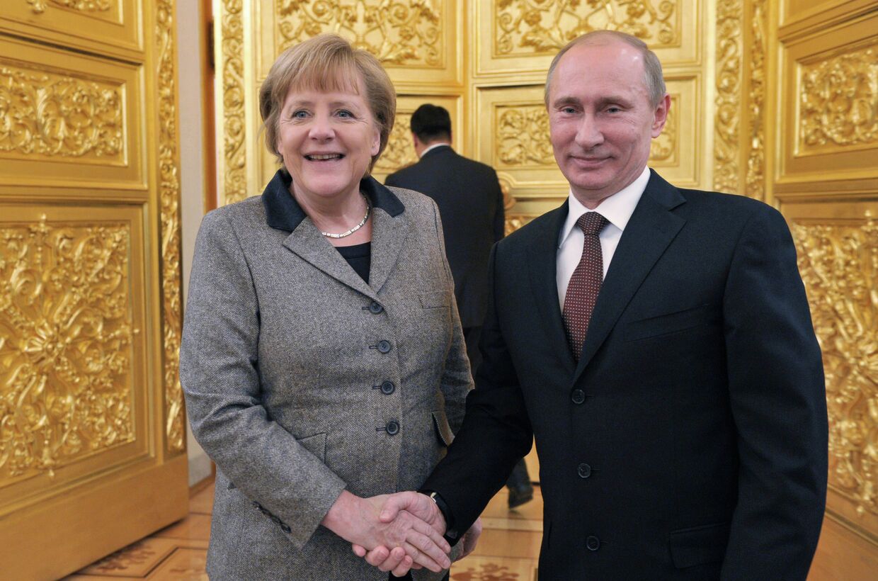 Владимир Путин и  Ангела Меркель на XII форуме «Петербургский диалог»