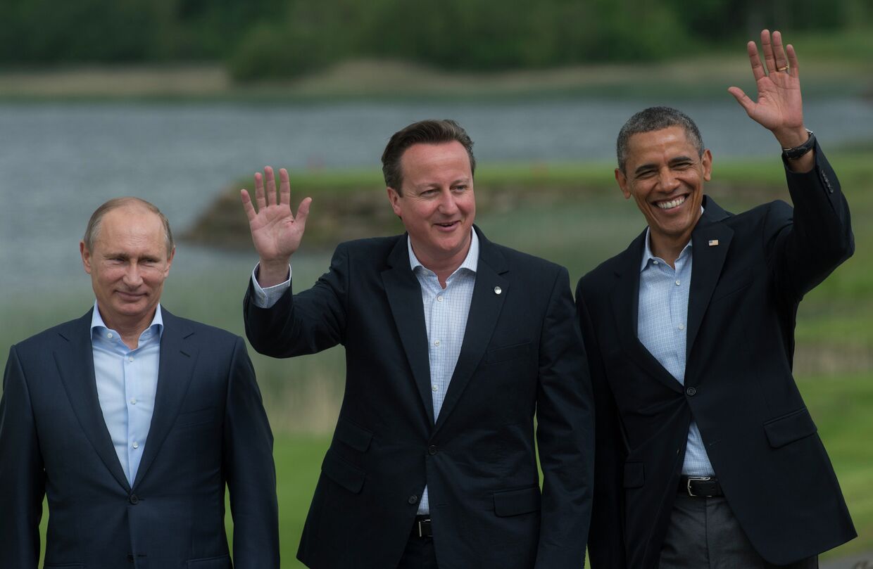 Президент России Владимир Путин, премьер-министр Великобритании Дэвид Кэмерон и президент США Барак Обама 