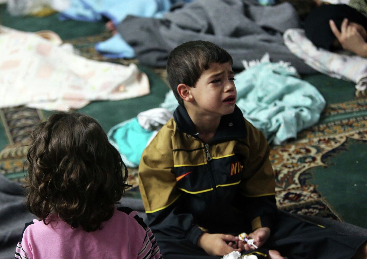 Мальчик в мечети Дамаска после химической атаки
