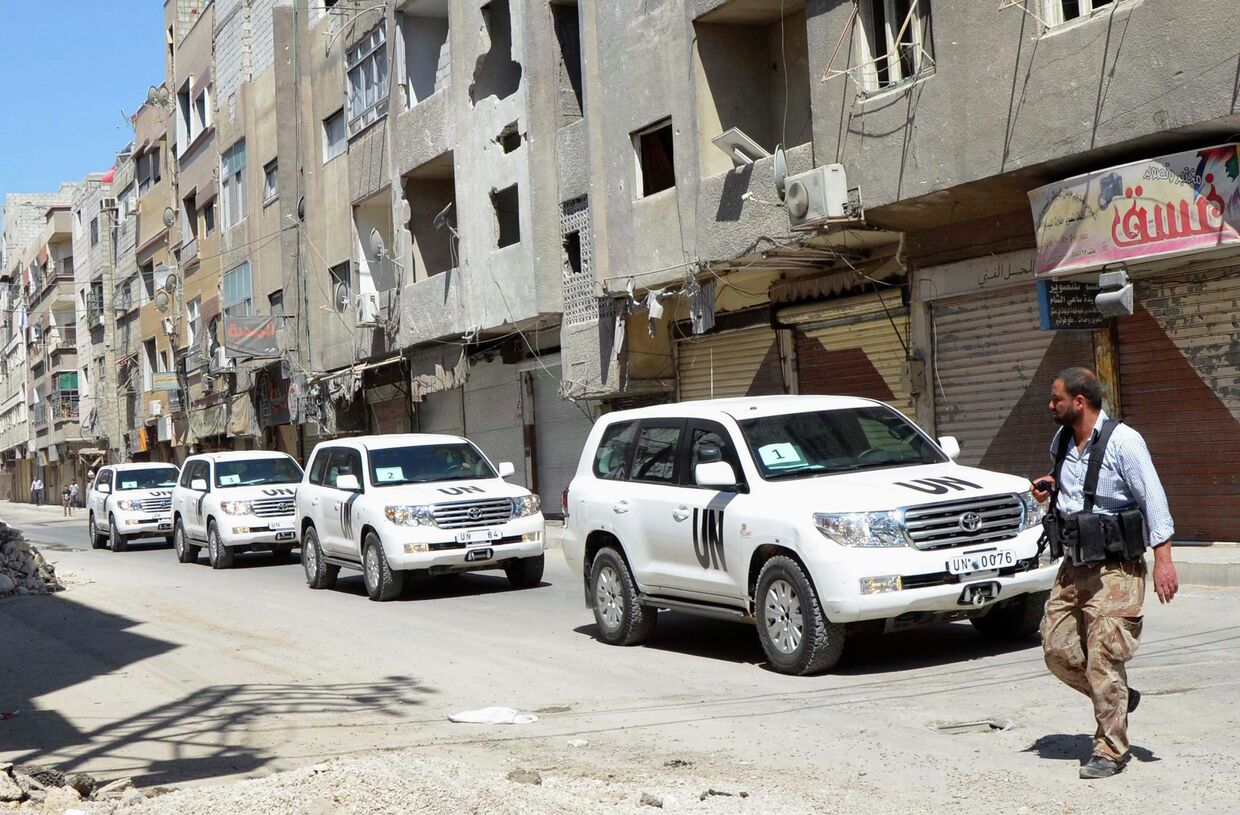 Колонна машин с инспекторами ООН по химическому оружию в Дамаске