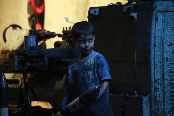 Десятилетний мальчик Исса из города Алеппо в Сирии