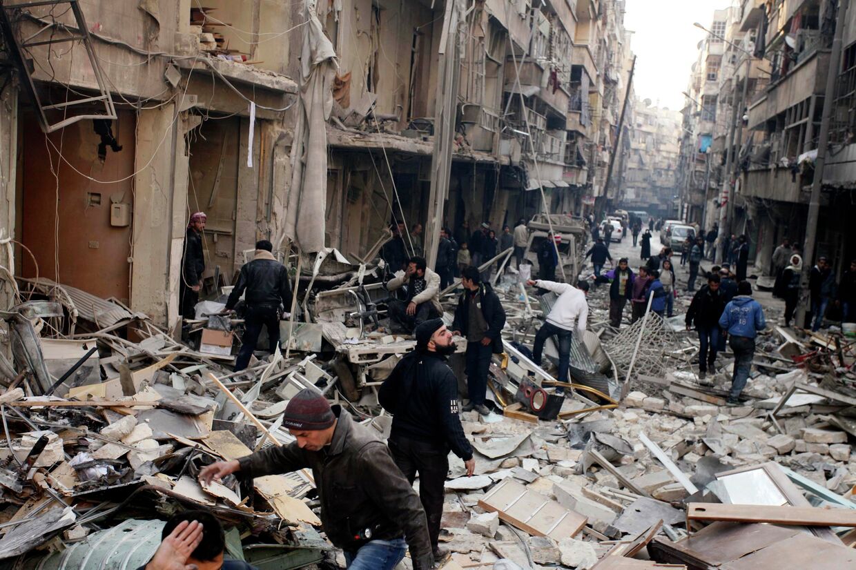 Последствия авиаударов в Алеппо, декабрь 2013. Архивное фото