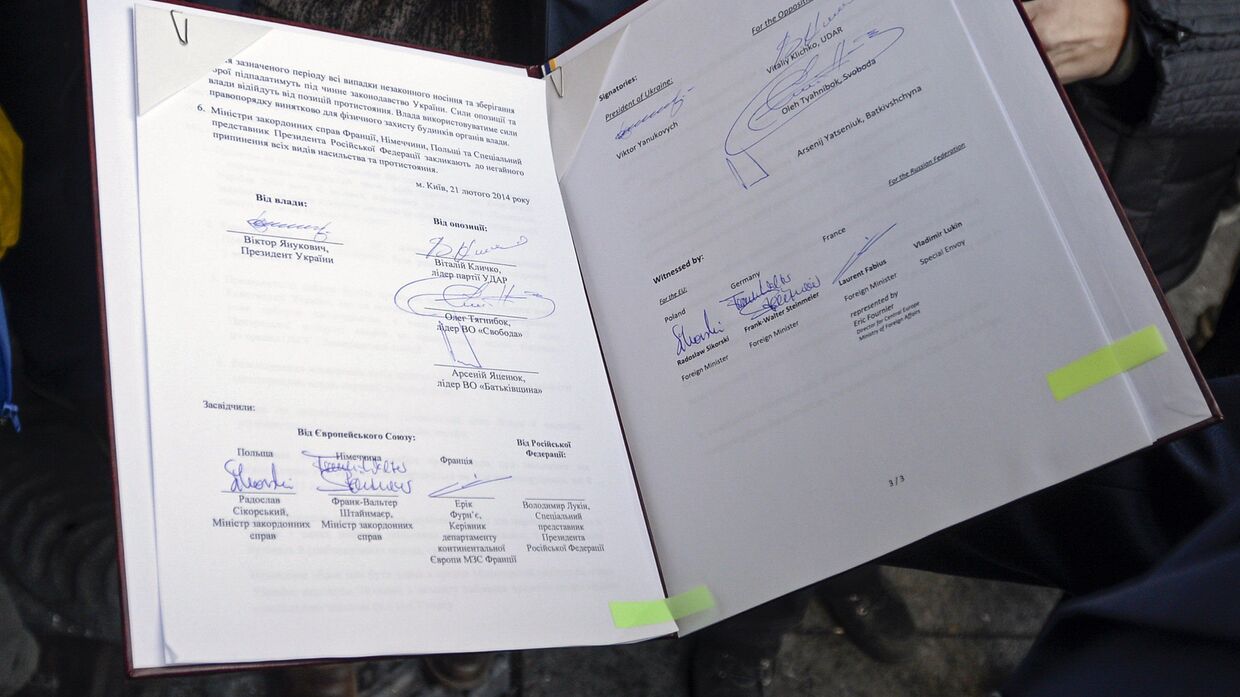 Мирное соглашение между президентом Украины Виктором Януковичем и лидерами оппозиции, подписанное в Киеве 21 февраля 2014