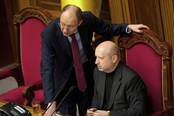 Александр Турчинов и Арсений Яценюк (слева) во время сессии парламента в Киеве