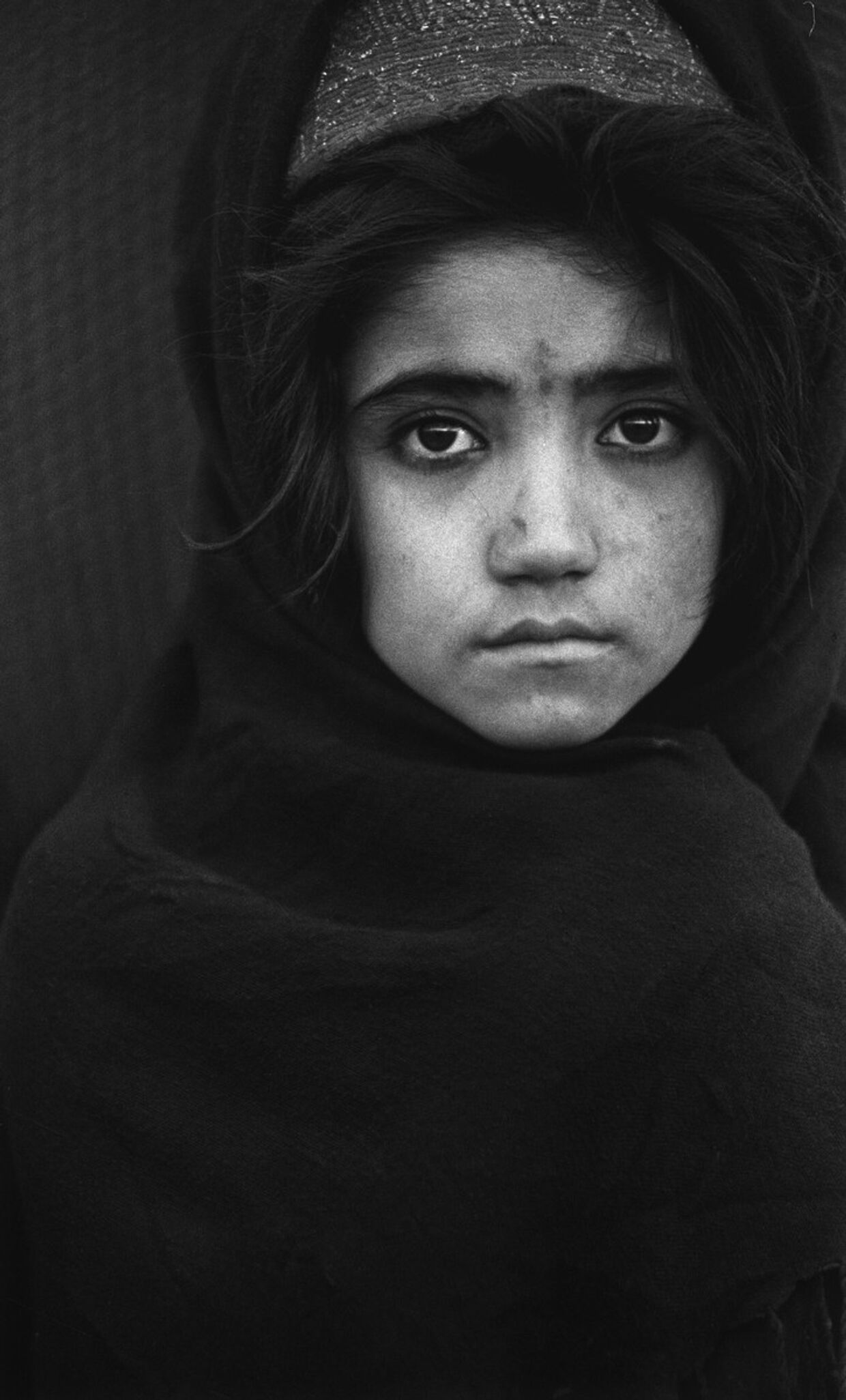 Девочка из Афганистана в лагере для беженцев. Фотография Захры Каземи