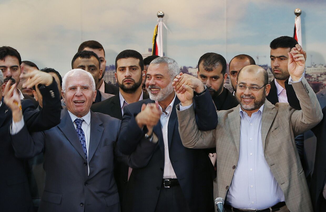Аззам аль-Ахмед, Исмаил Хания и Муса Абу Марзук после объявления о заключении договора о примирении движений «Хамас» и «ФАТХ»