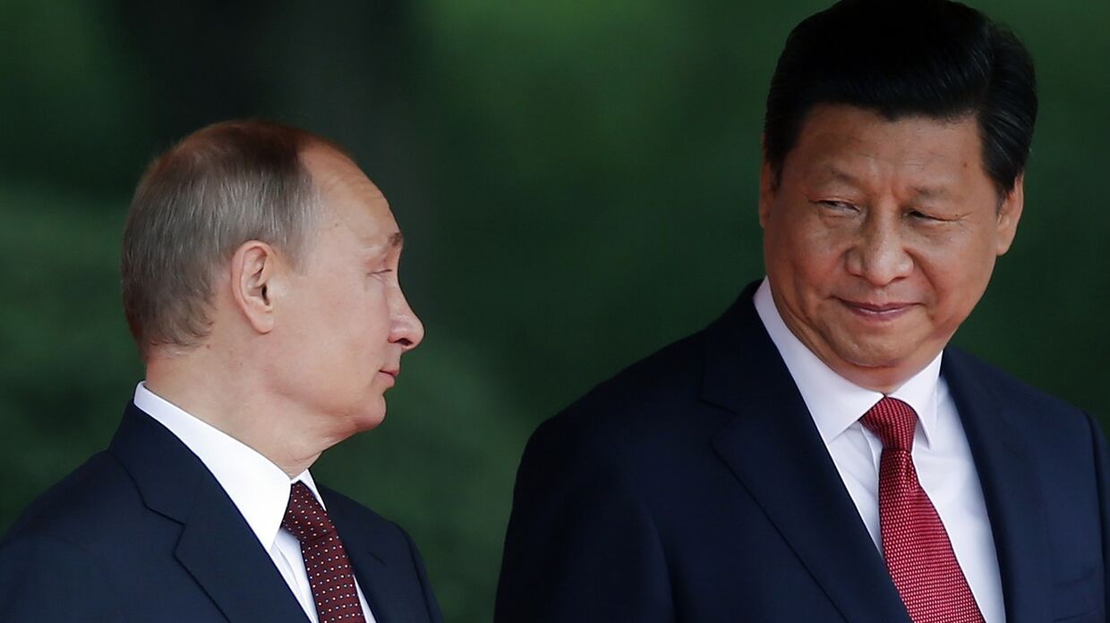 Владимир Путин с председателем КНР Си Цзиньпинем во время своего визита в Китай