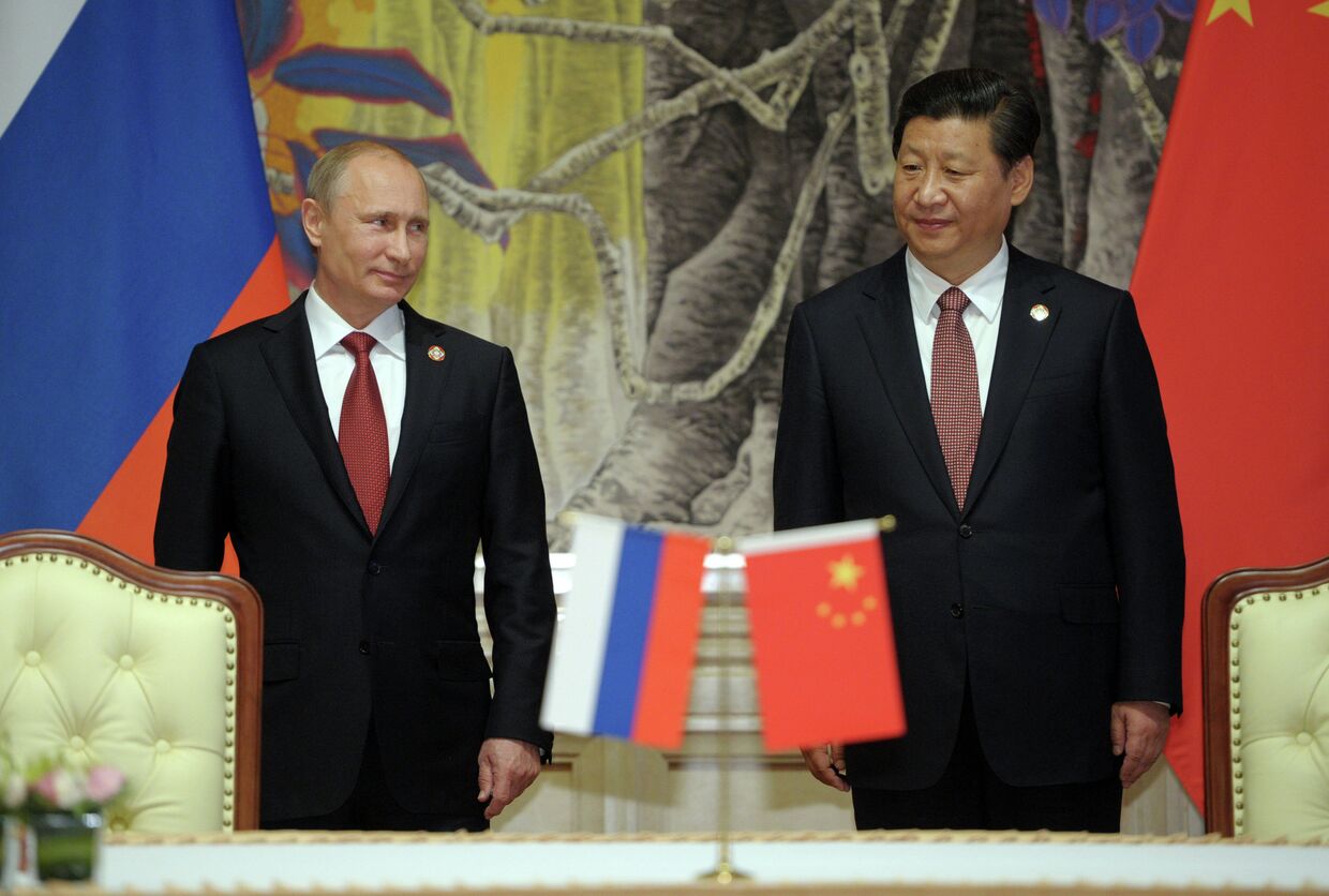 Президент России Владимир Путин и председатель Китайской народной республики Си Цзиньпин
