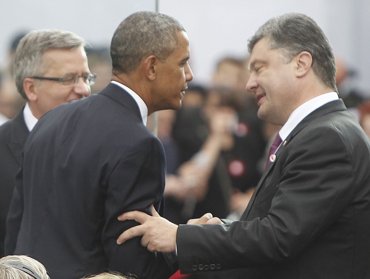 Барак Обама и Петр Порошенко на праздновании 25-летней годовщины первых парламентских выборов в Польше