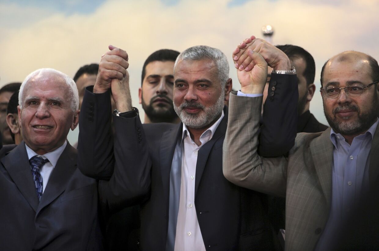 Аззам аль-Ахмед, Исмал Хания и Муса Абу Марзук после заключения договора о примирении между движениями ХАМАС и ФАТХ 