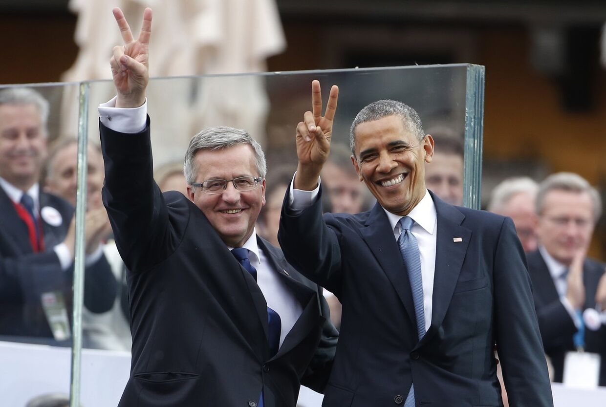 Барак Обама с президентом Польши Брониславом Коморовским во время визита в Варшаву