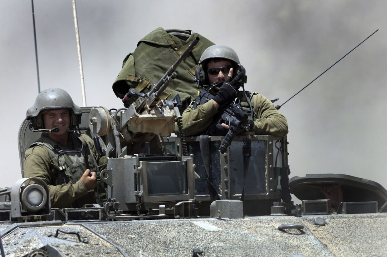 Израильские солдаты возвращаются из сектора Газа