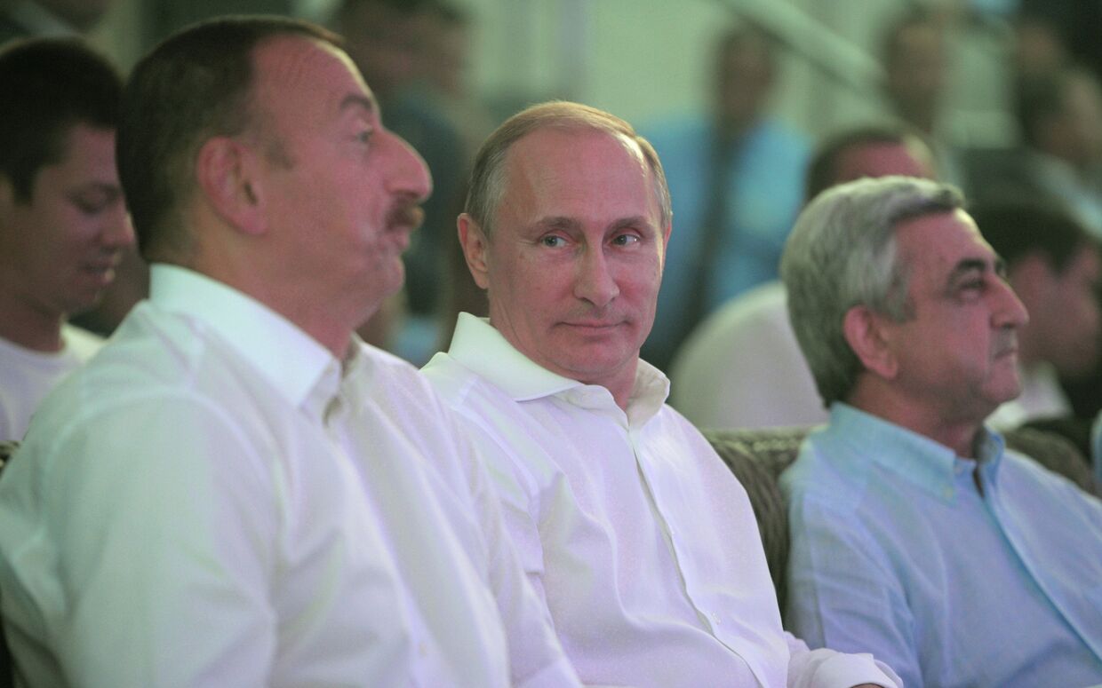 Ильхам Алиев, Владимир Путин и Серж Саргсян в Сочи на турнире по самбо. 9 августа 2014 г
