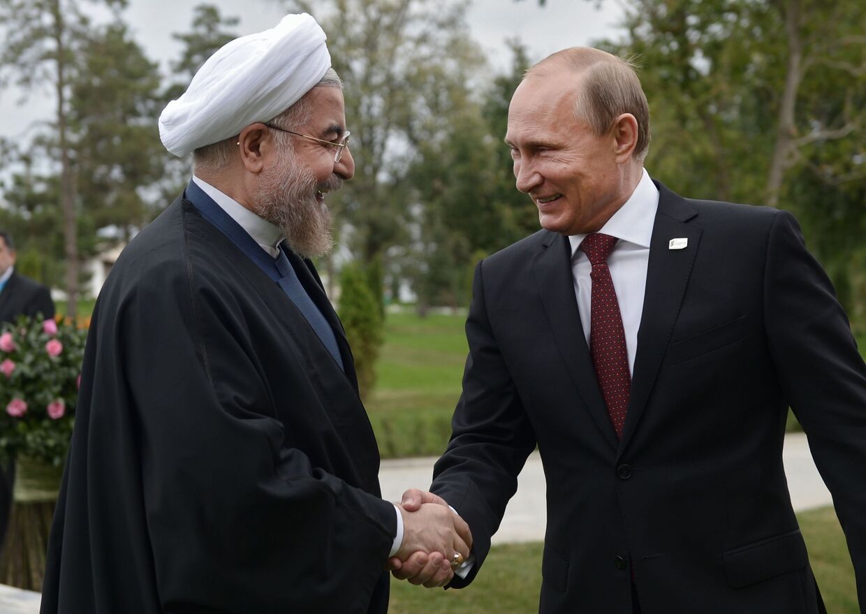 Владимир Путин и президент Ирана Хасан Рухани на IV Каспийском саммите в Астрахани