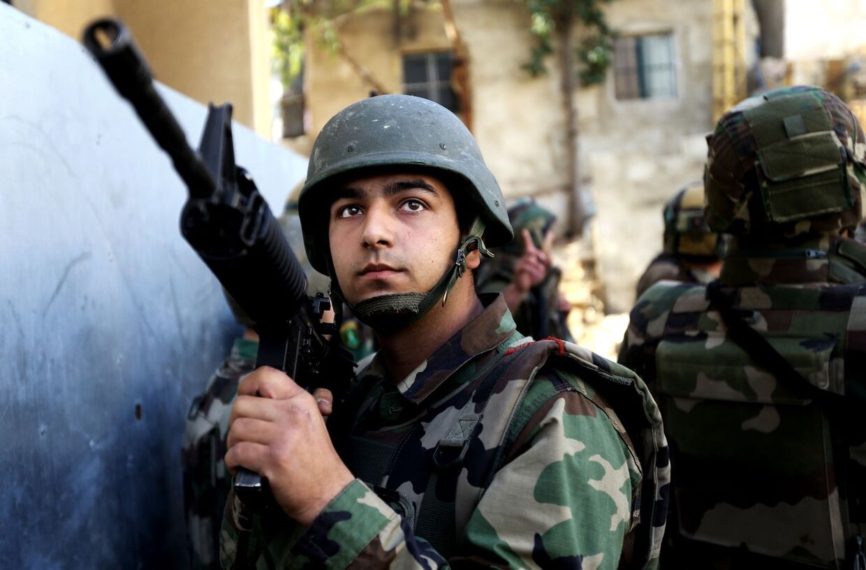 Солдат ливанской армии во ремя столкновений между сторонниками и противниками сирийского президента Башара Асада в Бейруте