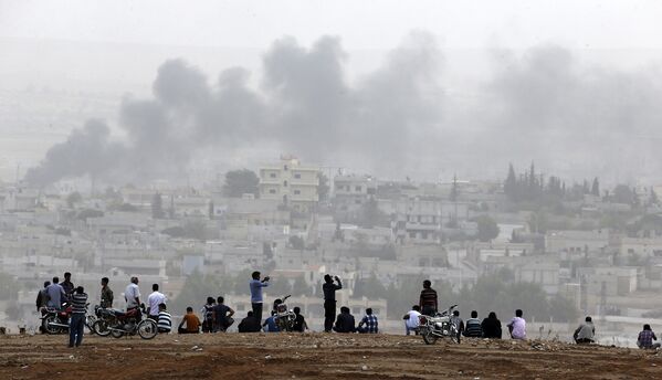Турецкие курды наблюдают за ситуацией в Кобани 