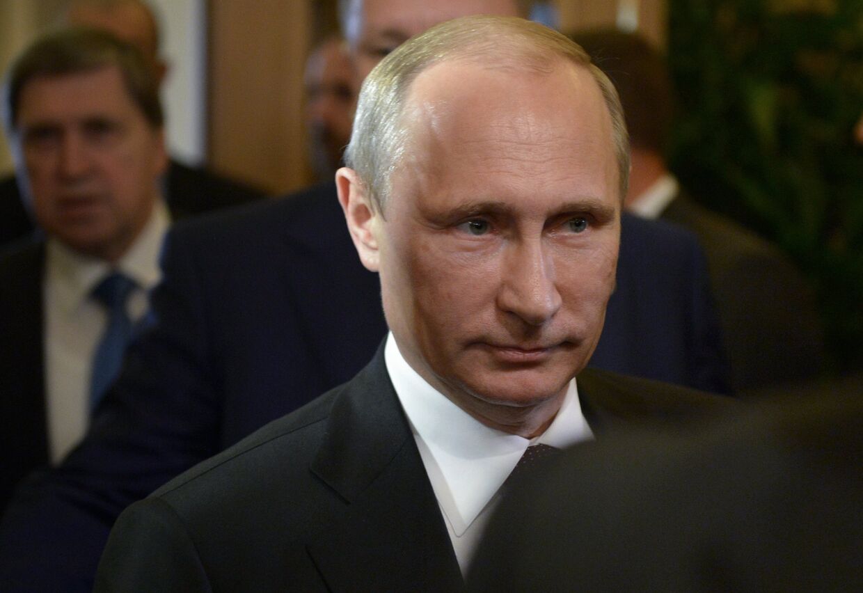 17 октября 2014. Президент РФ Владимир Путин после встречи в нормандском формате в рамках саммита форума Азия-Европа