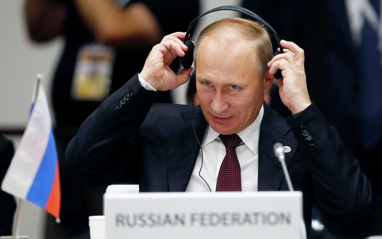 Президент РФ Владимир Путин на заседании саммита форума Азия-Европа 17 октября 2014