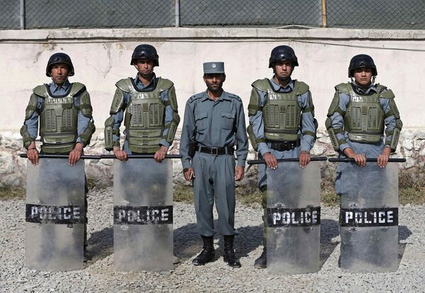 Полицейские из подразделения по подавлению беспорядков в Кабуле