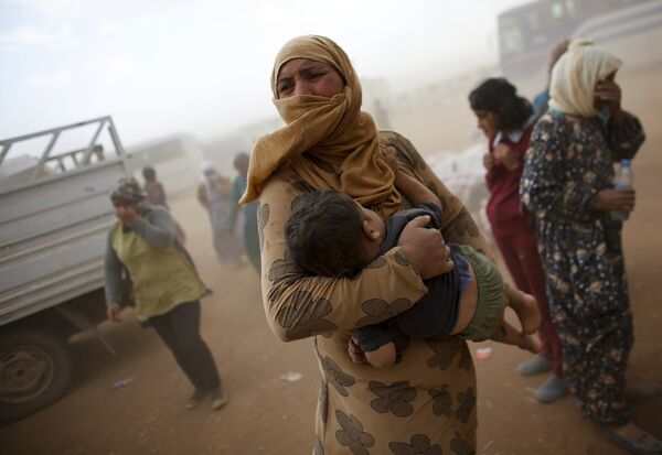 Беженцы-курды на сирийско-турецкой границе
