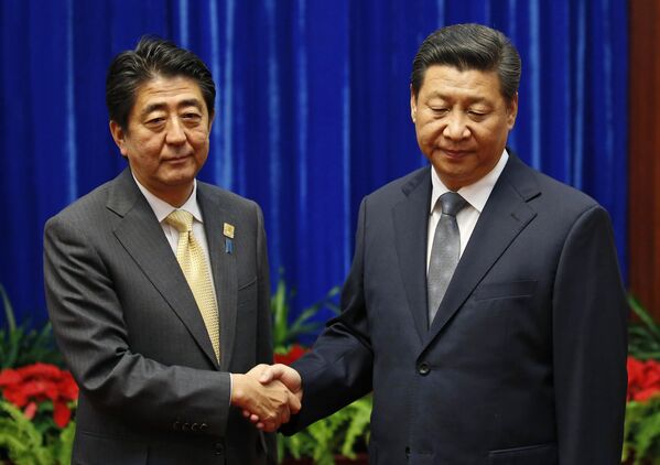 Встреча Си Цзиньпина и Синдзо Абэ на полях саммита АТЭС в Пекине